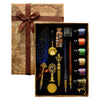 A luxury fountain pen set with a wax seal kit presented in a brown paper box and wooden display case.