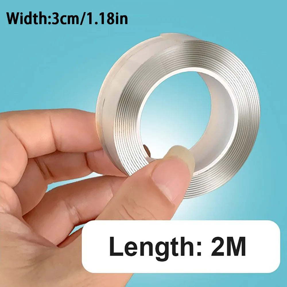 A hand holds a silver, double-sided adhesive tape with a 2-meter length and 3cm width.