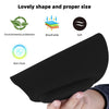 Black ergonomic mouse pad with a curved shape and wrist support shown being held by a hand.