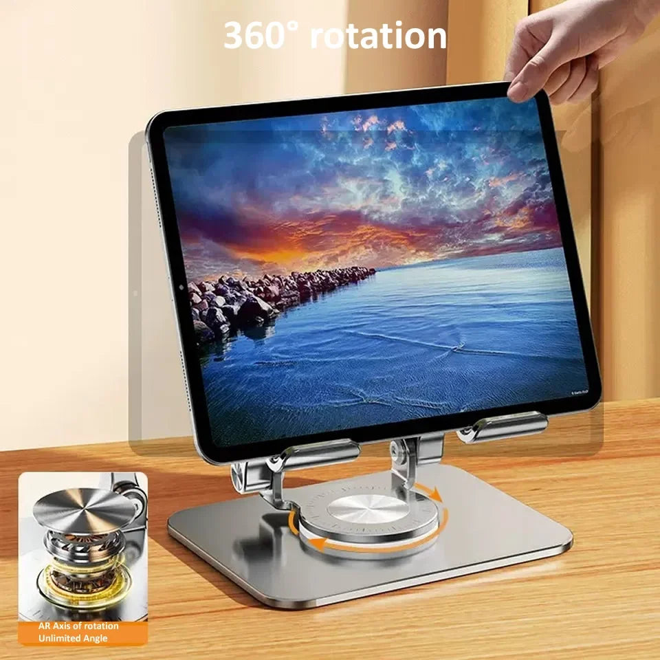 A tablet is mounted on a rotating stand, displaying a vibrant sky scene, demonstrating 360 degree rotation.