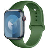 A dark green silicone sport band for an Apple Watch displayed on a white background.