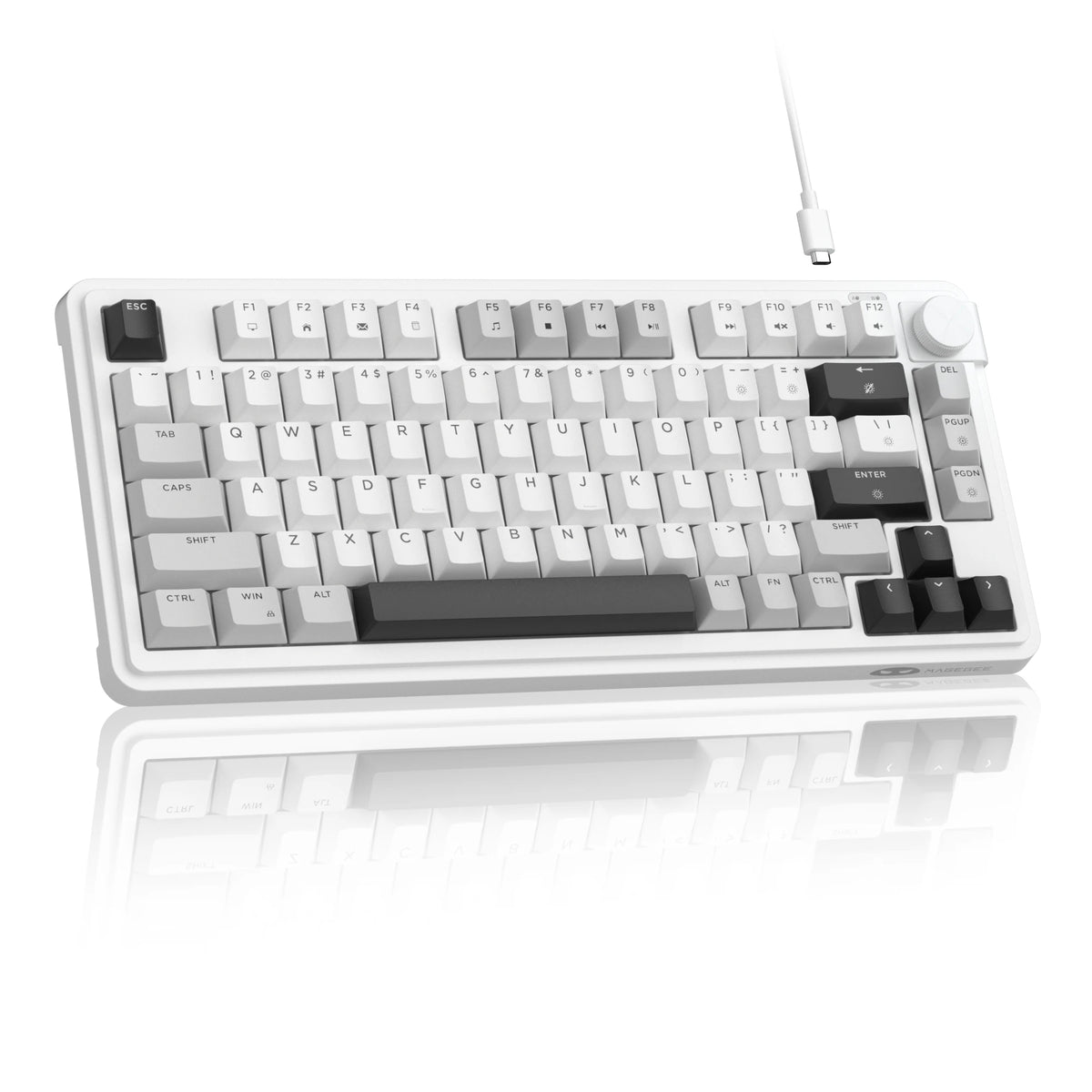 Teclado compacto de membrana blanco con perilla giratoria y teclas de palanca.