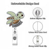 A retractable badge reel featuring a lizard charm, a swivel alligator clip, nylon cord, and a strong metal pinch clip.