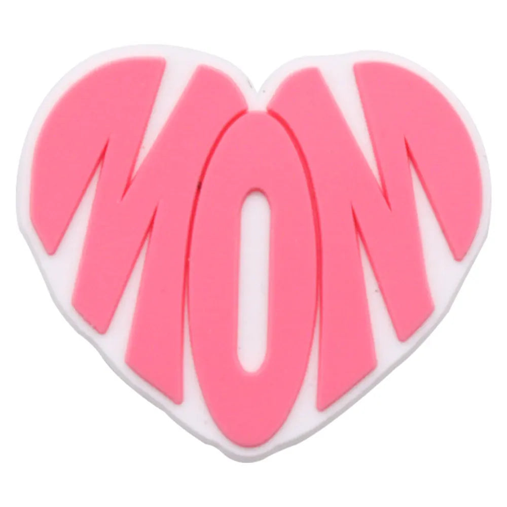 A pink heart-shaped charm with the word MOM molded into it, used as a personalized gift for mom.