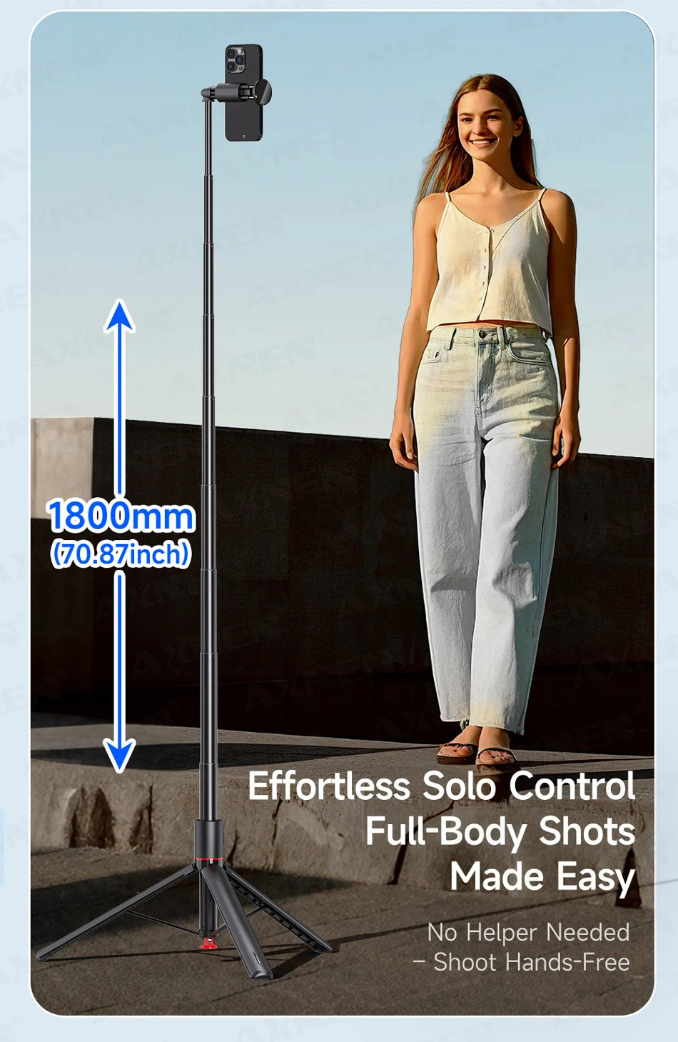 A woman is holding an effortless solo full-body shot using a tripod selfie stick for hands-free photography.