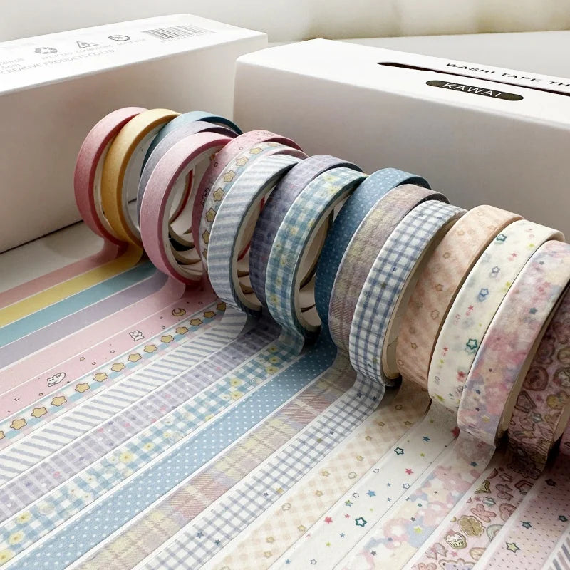 A collection of colorful retro washi tape rolls arranged in a line on a white surface.