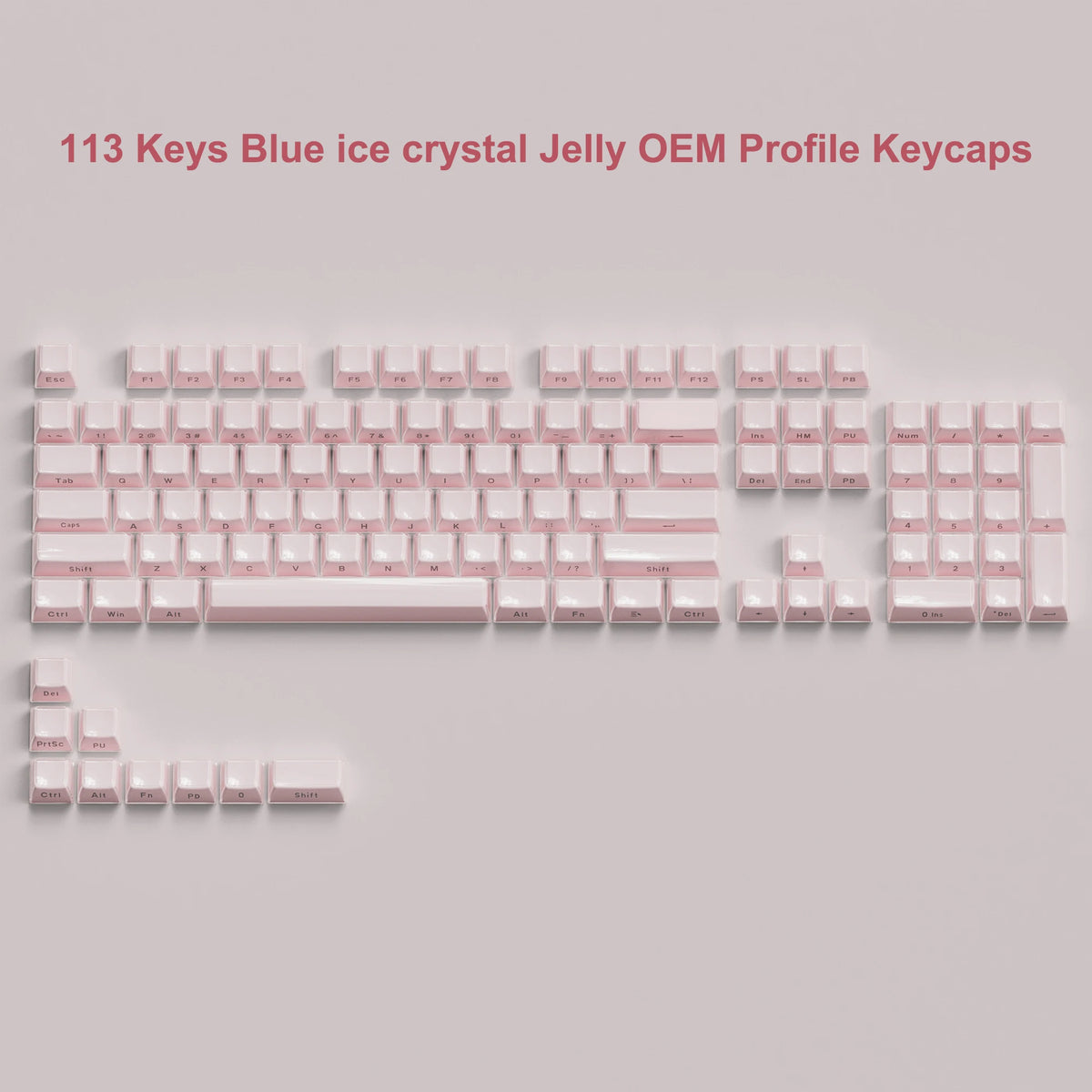A collection of 113 blue ice crystal jelly OEM profile keycaps for mechanical keyboards.