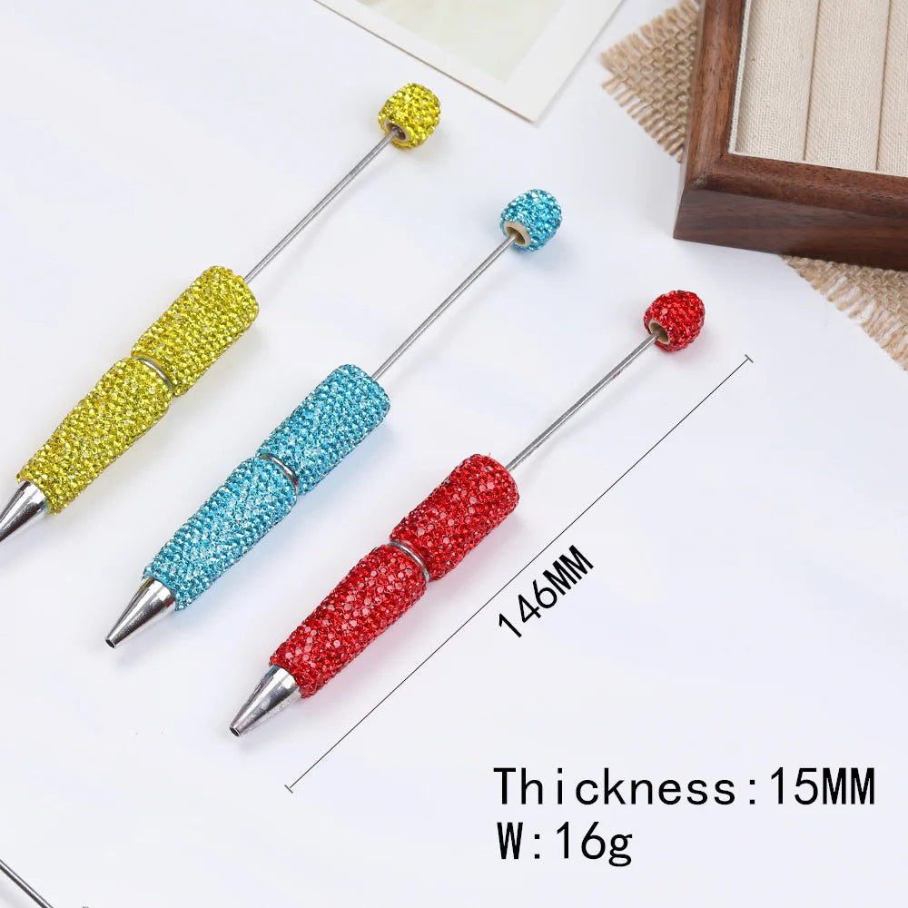 A set of four DIY rhinestone beaded pen accessories with various colors and a 146mm length shown on a white background.