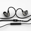 A set of high-fidelity wired in-ear headphones with black cables and earphone tips.