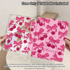Pink cherry y-fold protective cover for an iPad shown in a clear case and a solid pink version.