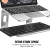 Aluminum alloy laptop stand holding a MacBook and an external keyboard.