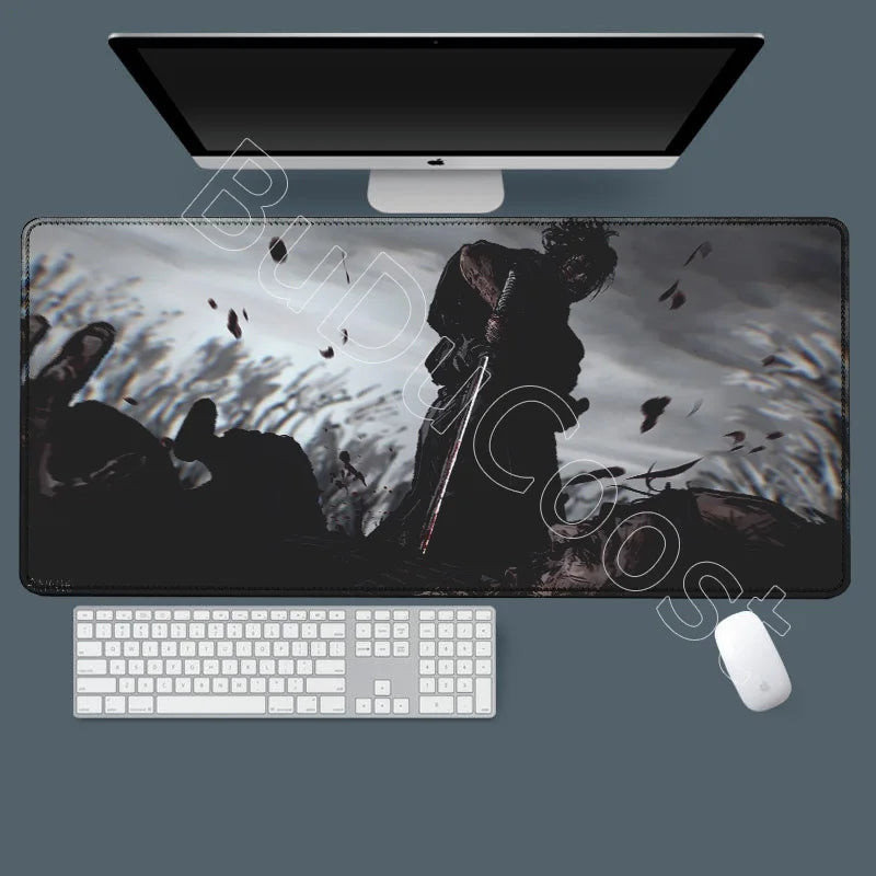 A black gaming mousepad featuring an illustration of Miyamoto Musashi from the Vagabond manga.