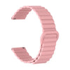 A pink adjustable magnetic loop watch band shown in a curved shape.