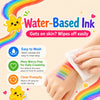 A hand applies colorful water-based ink to skin, demonstrating its easy washability and clean application.