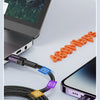 A black data sync cable connects a laptop to an iPhone, illustrating faster data synchronization.