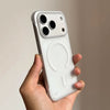 A hand holds a white Slim Magnetic Phone Case for iPhone Magsafe, showing the back design.