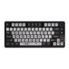A black mechanical keyboard featuring a CSGO gaming keycap set with transparent pudding style PBT keycaps.