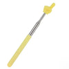 A yellow adjustable telescopic reading stick with a metal tip and handle.