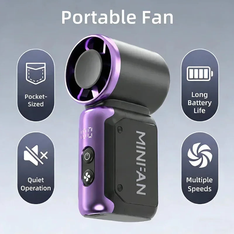 A portable mini fan with a purple accent and black body is shown against a light gray background.