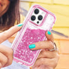 A hand holds a pink glitter liquid phone case with a vibrant pink and purple sparkle design against a yellow background.