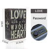 A dark wooden box with carved text LOVE with your WHOLE HEART and a lock mechanism for secret cash storage.