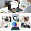 A person is using a universal Bluetooth keyboard case for an iPad on a white desk.