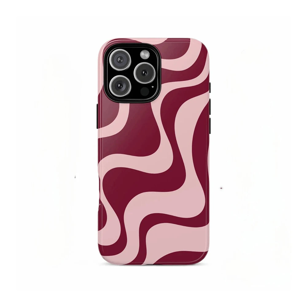 A phone case featuring a dual-layer design with swirling pink and maroon patterns.