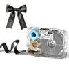 A clear plastic label maker device with a ribbon and bow, used for creating custom stickers.