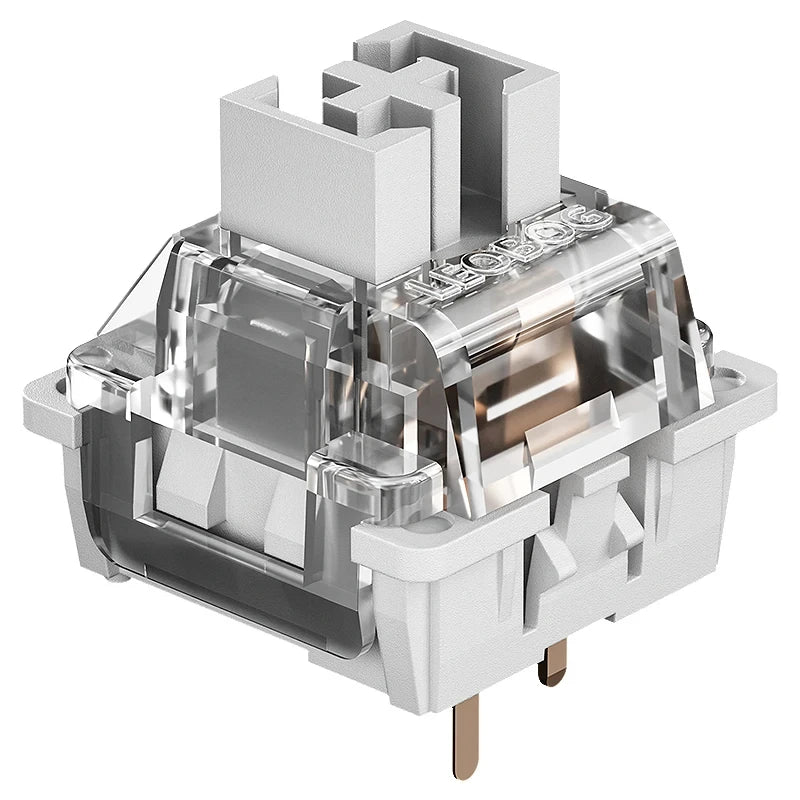 A close-up view of a gray wood mechanical keyboard switch housing with clear plastic components and metal pins.