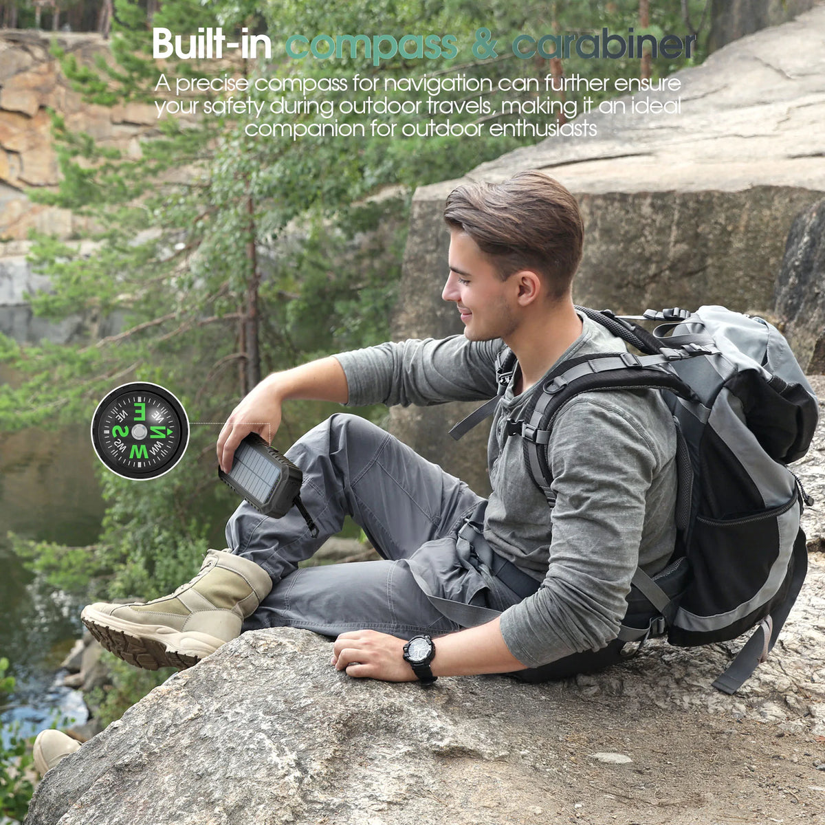 A man uses a built-in compass and carabiner for navigation while outdoors with a solar power bank.