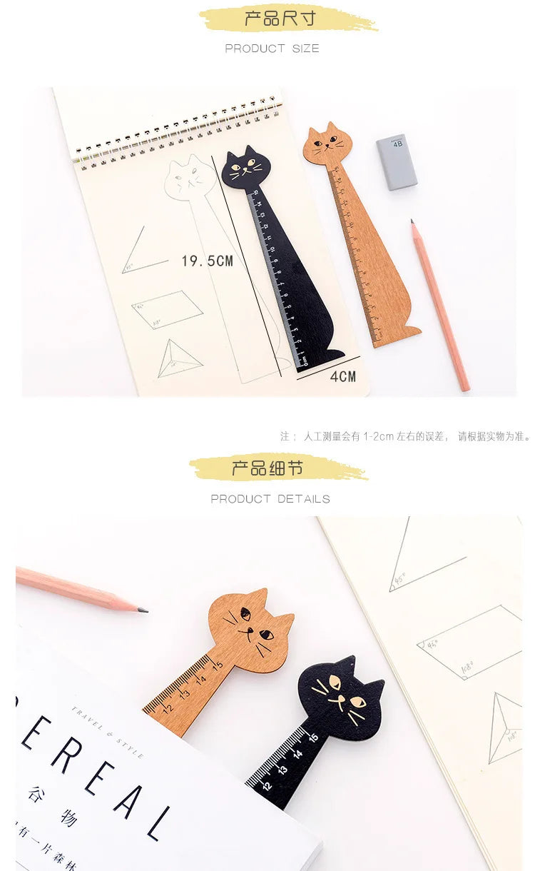 A set of cute cartoon cat wooden drawing rulers and pencils shown next to a sheet of paper.