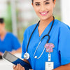 A smiling female healthcare worker wearing blue scrubs and a stethoscope with an anime large intestine badge reel.