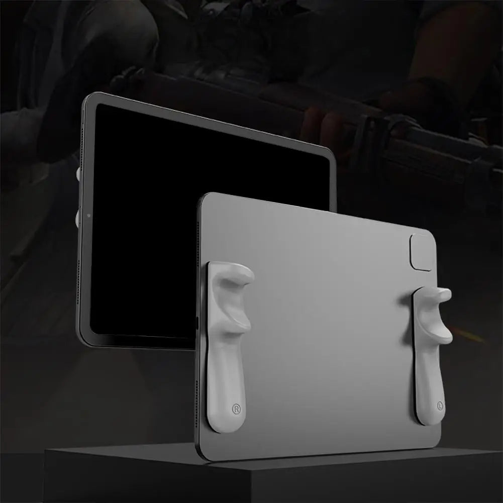 A gray silicone multi-finger grip is shown next to a tablet, used as a gaming accessory.