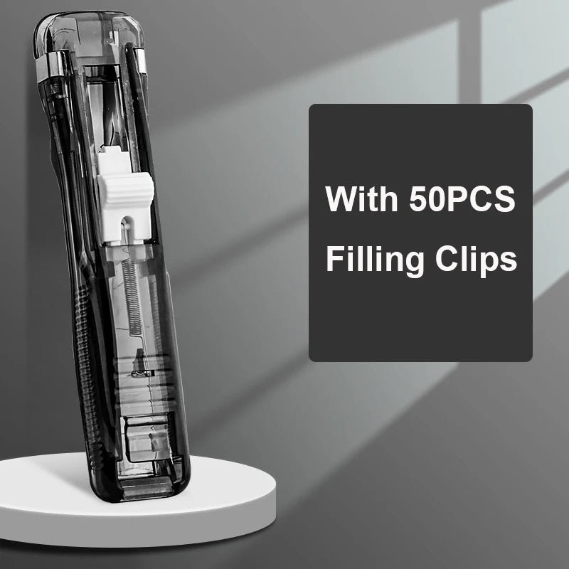 A clear handheld binder clip pusher with stainless steel refill clips displayed on a gray background.