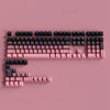 A pink gradient PBT keycap set for mechanical keyboards displayed on a light pink background.