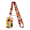 A colorful card holder lanyard featuring a repeating pattern of cartoon cats on an orange strap with a hanging card holder.