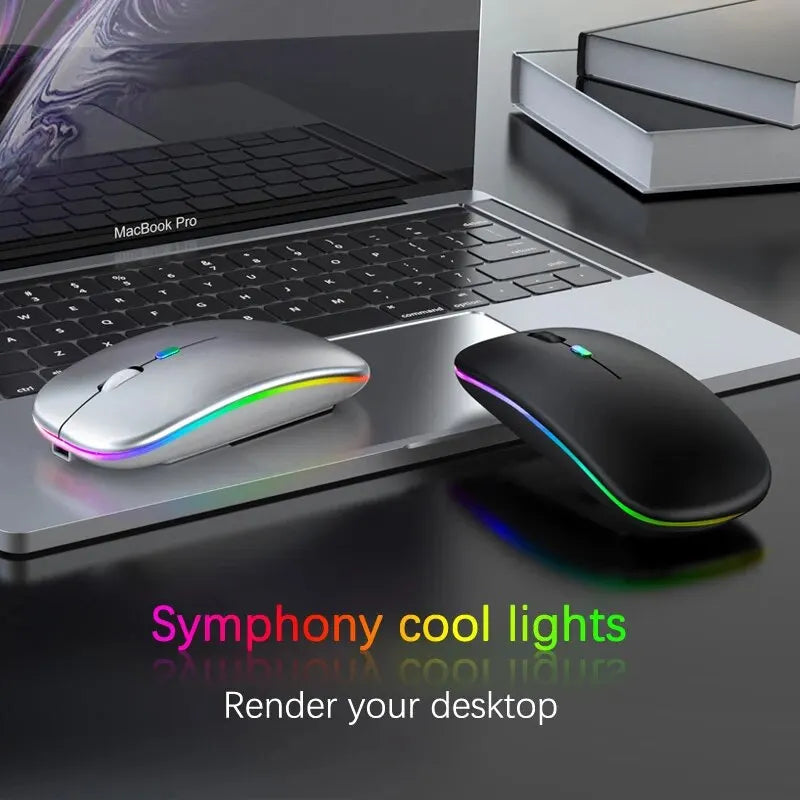 Silber- und schwarze kabellose Gaming-Maus mit farbigen RGB-Lichteffekten auf einem MacBook Pro Laptop.