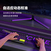 A close-up of a purple and black mechanical keyboard with glowing switches, showing hands typing on the device.