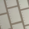 A set of ten transparent divider pages for loose-leaf planners, showing various sizes and layouts.