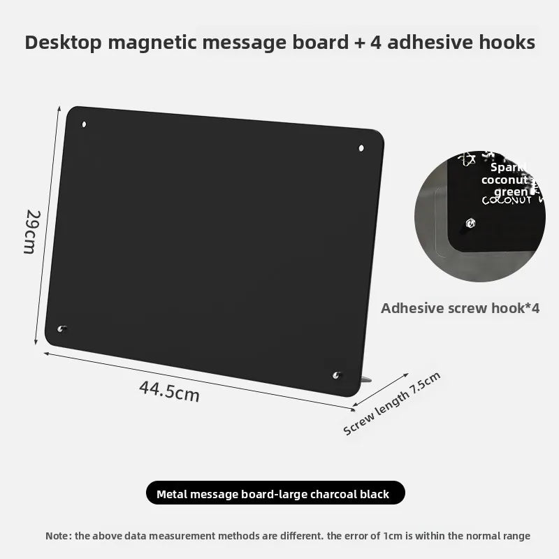Black metal message board with four adhesive hooks and a reusable writing surface
