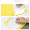 A yellow hybrid protective case for an iPad, showing how to insert a stylus into the pencil holder.