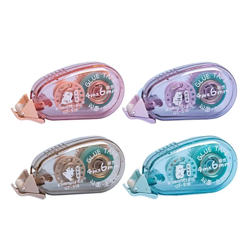 Three transparent adhesive tapes in pink, purple, and blue packaging with silver applicator tips.