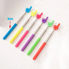 A set of six telescopic stainless steel teaching pointers in various colors including blue, yellow, pink, purple, green, and 