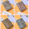 A leopard print A6 binder with a 6-hole loose leaf system shown in multiple angles.