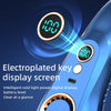 Close-up of a blue electronic device showing an electroplated key display screen with a digital readout.