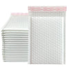 A stack of white padded bubble mailers with self-seal closures.