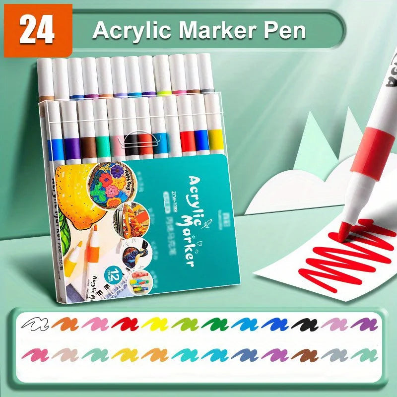 Ein Set von 24 professionellen Acrylmarker-Stiften in verschiedenen Farben neben einem roten Stift auf weißem Papier.