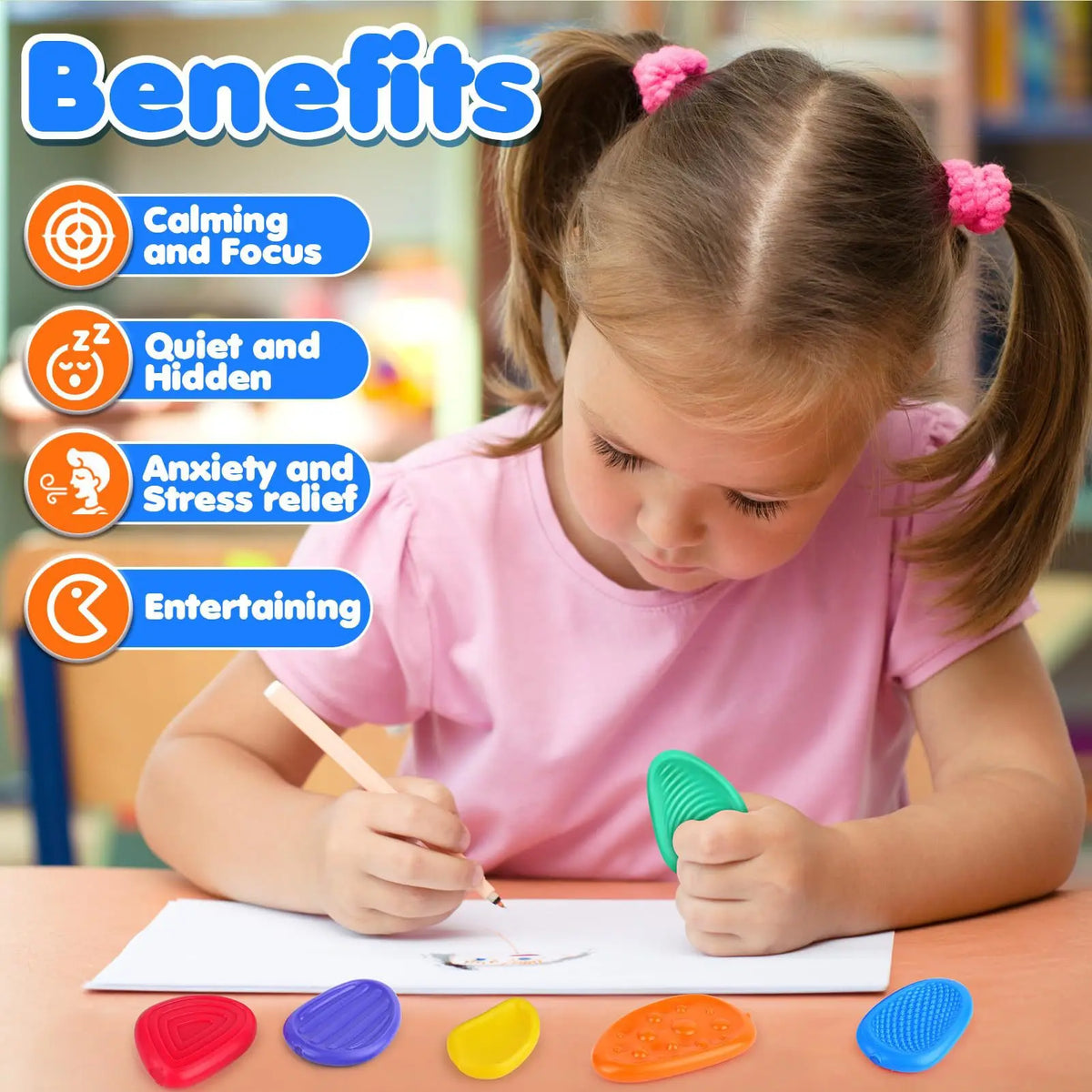 A young girl is using a sensory stone fidget box for stress relief, with various colored stones on a table.