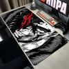 A large black and white anime design mouse pad featuring a fierce demonic face and red 'H' symbol on a desk.