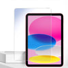 A close-up view of a 9H screen protector being applied to an iPad, showing vibrant colors on the screen.